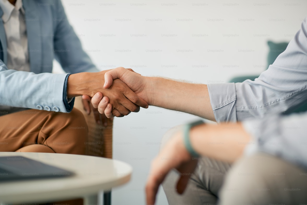Industrial engineering consultation and partnership handshake